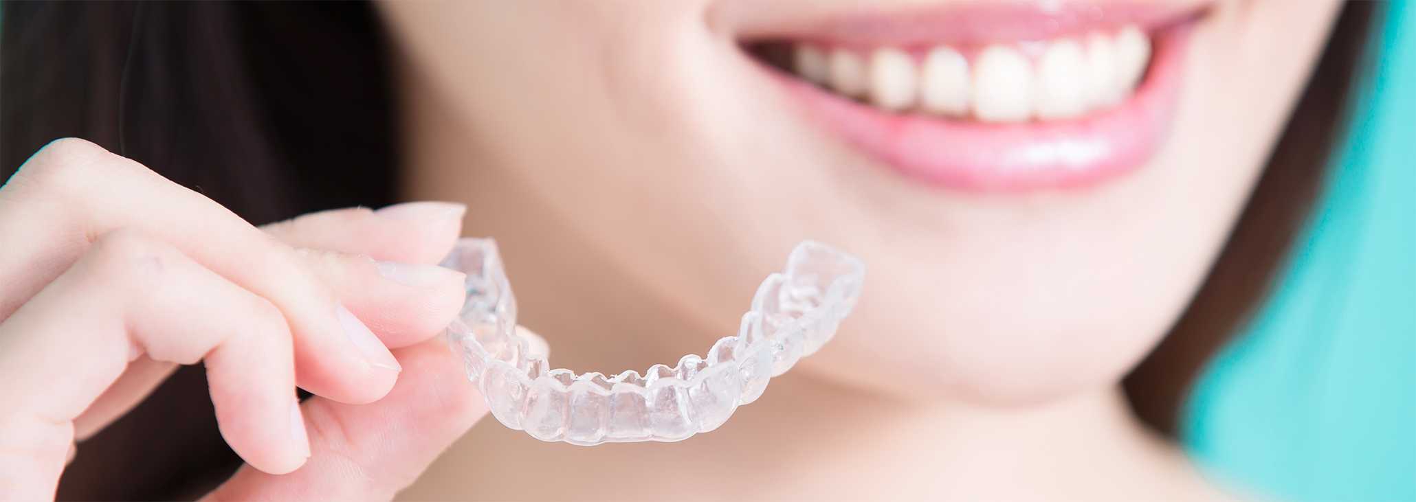 Close up of woman with straight teeth smiling