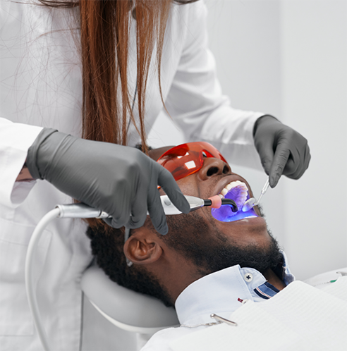 Man receiving professional teeth whitening