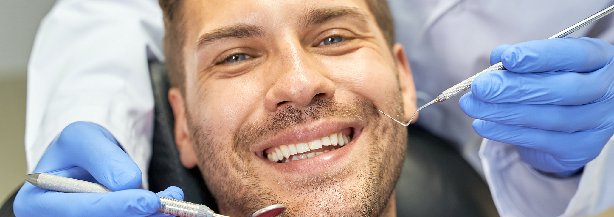 Close up of man smiling during dental exam