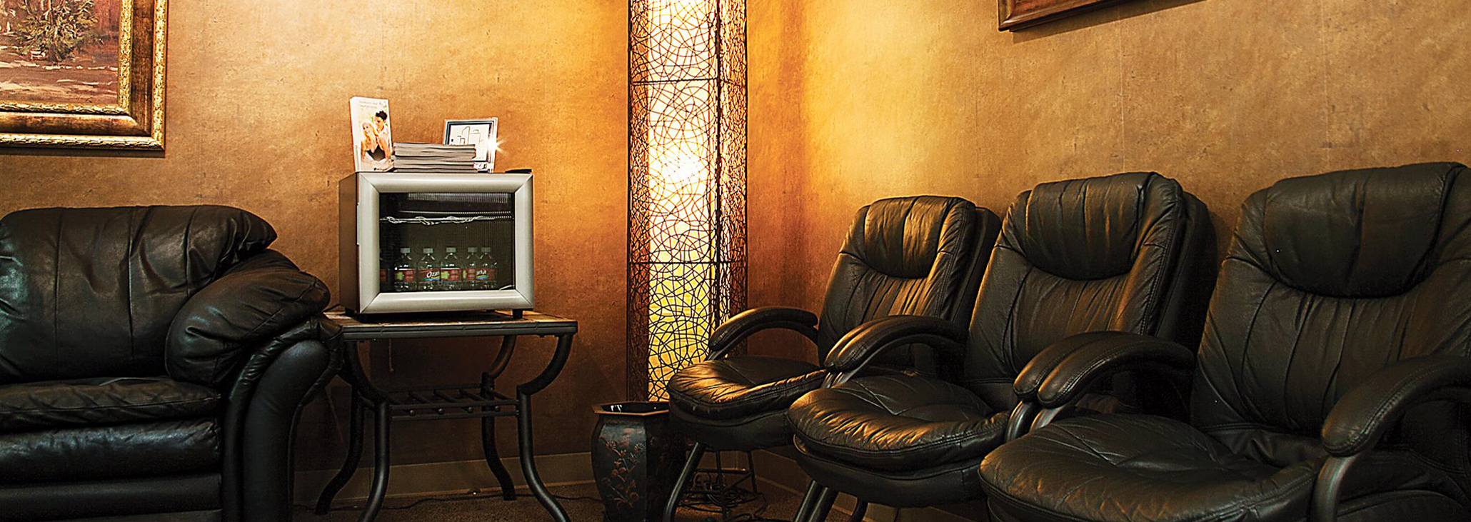 Comfortable chairs lined up against wall