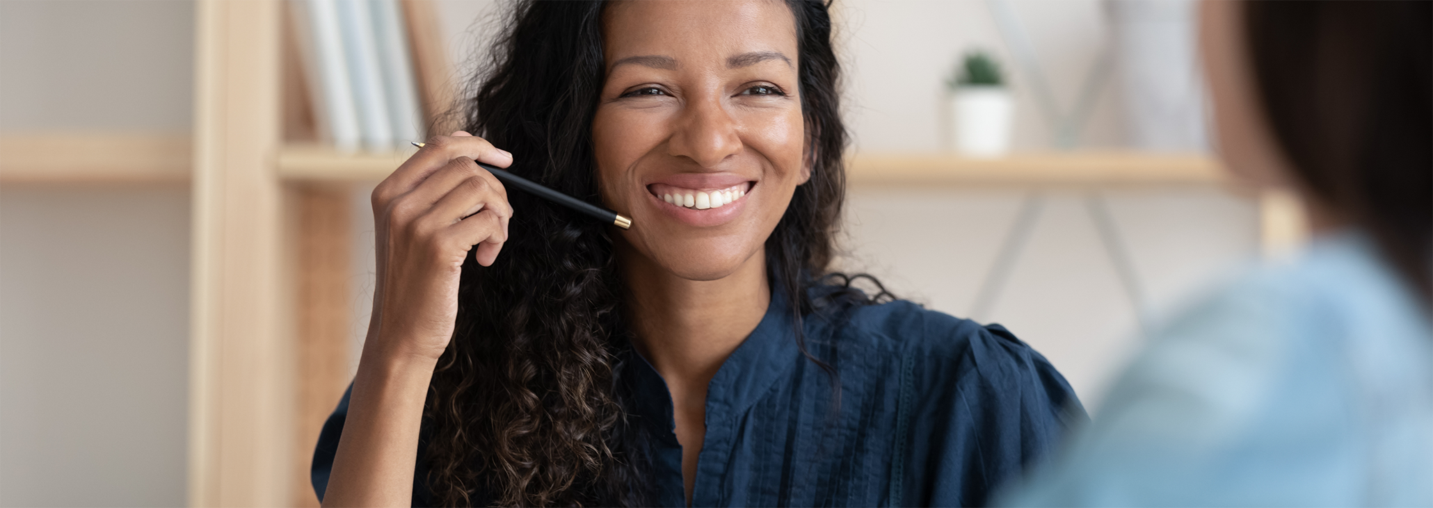 Female patient smiling at dentist