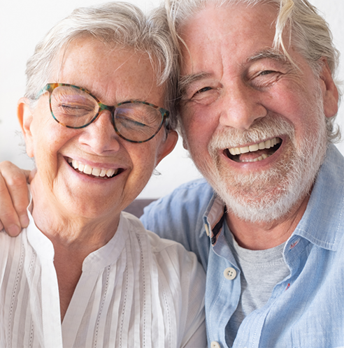Senior man and woman smiling
