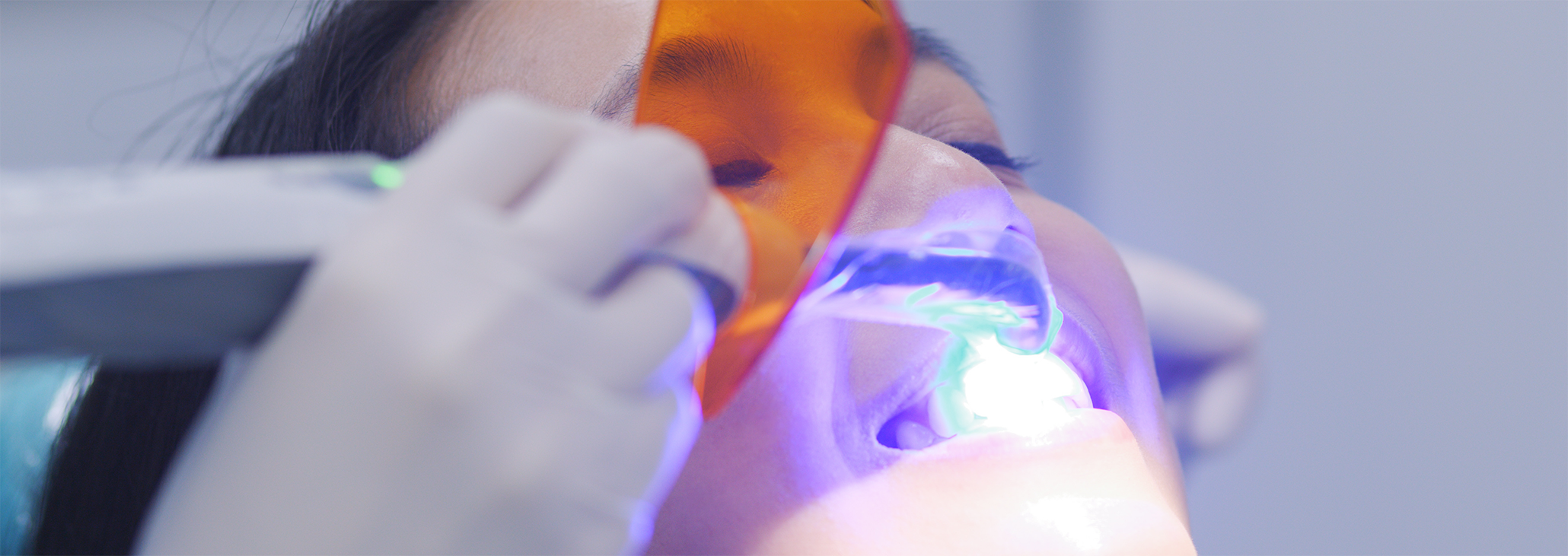 Patient receiving professional teeth whitening in Midland