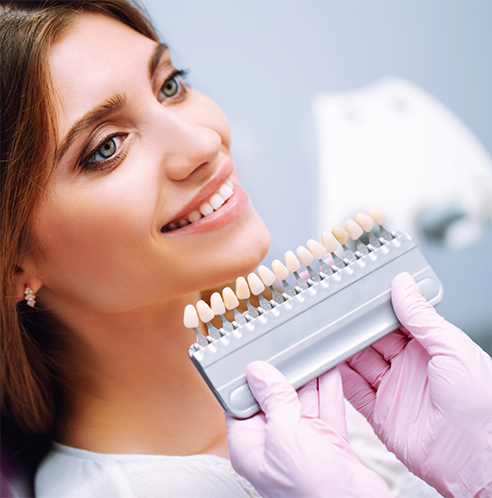 Woman having teeth shade matched