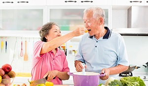 older couple eating healthy foods